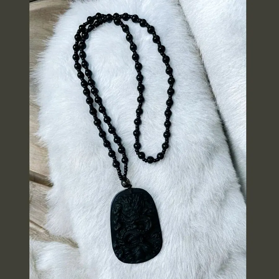 Fortune Amulet — รูป